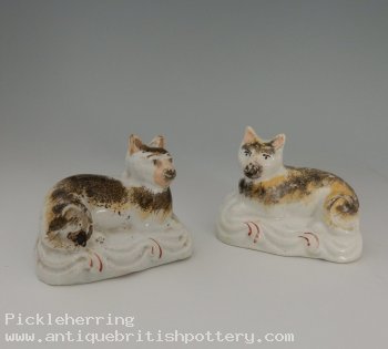 Pair Recumbent Cats Scrolled Bases